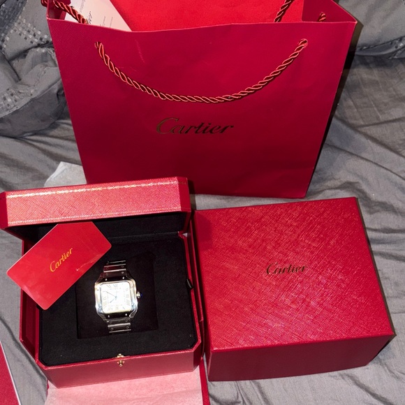 Cartier Women's Silver and Black Watch
